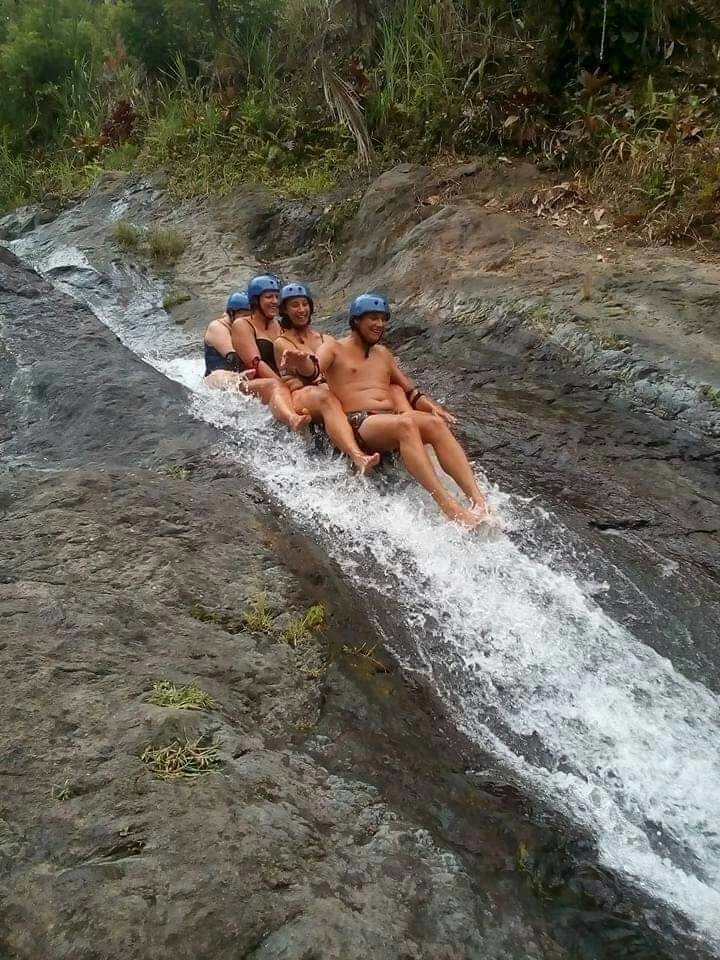 Natural Waterslide at Sekumpul Waterfall Bali
