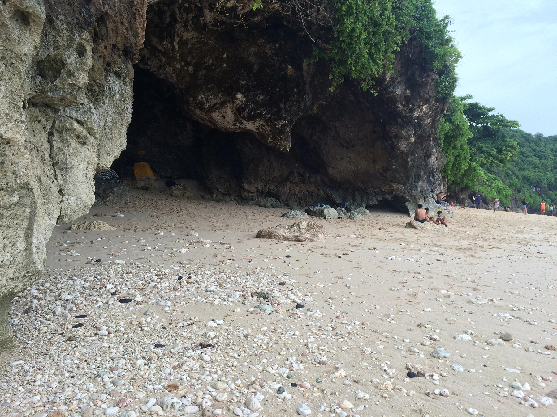 Natural cave formations at Green Bowl Beach in Bali