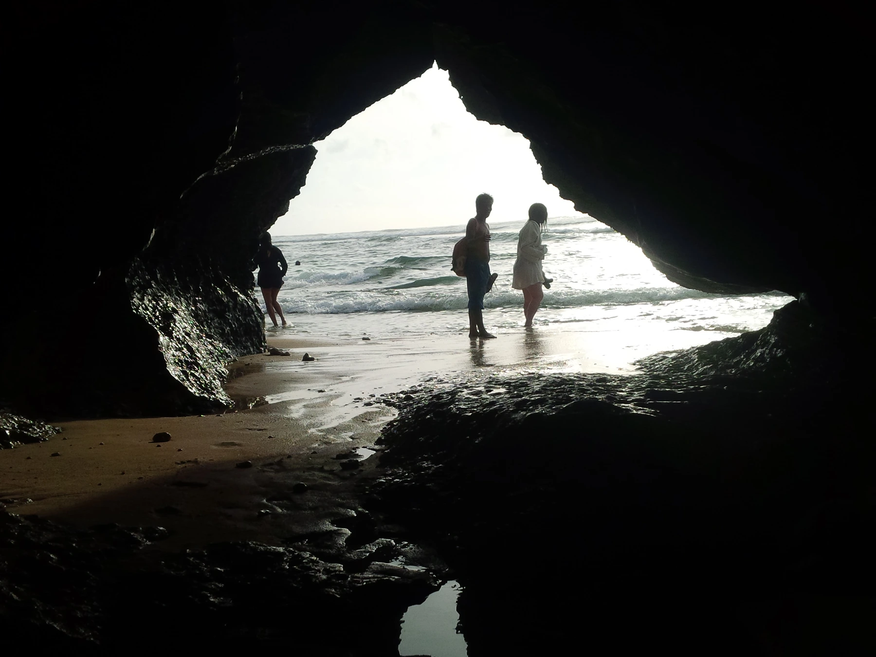 Natural cave passage leading toward Blue Point Beach in Uluwatu